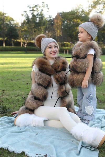 모피 폼폼이 달린 캐시미어 모자